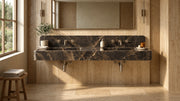 60-inch Emperador Dark marble floating double sink in a travertine bathroom